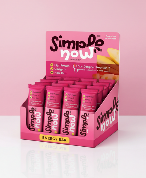 Display of Simple Now energy bars in pink packaging on a white background